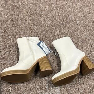 Stylish White and Tan Heeled Boots with Textured Finish